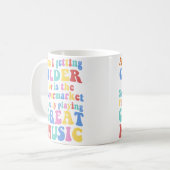 Am I Getting Older Or Is The Supermarket Playing G Koffiemok (Voorkant links)