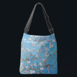 Amandelbloesems Blauw Vincent van Gogh Art Crossbody Tas<br><div class="desc">Vincent van Gogh (Nederlands, 1853 - 1890) Amandelbloesem, 1890, Olieverf op doek Niet ingelijst: 73, 3 cm x 92, 4 cm Vincent van Gogh schilderde dit stilleven van amandelbloesems tegen een blauwe lucht voor zijn pasgeboren neefje die naar hem vernoemd was. De amandelboom is een symbool van dit nieuwe leven....</div>