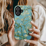 Amandelbloesems | Vincent van Gogh iPhone 16 Hoesje<br><div class="desc">Amandelbloesems (1890) van Vincent van Gogh (1853-1890). Van Goghs schilderij Amandelbloesems toont delicate witte bloemen tegen een levendige turquoise hemel, die nieuw leven en vernieuwing symboliseert. Geïnspireerd door de Japanse kunst, creëer de elegante takken en vloeiende lijnen een gevoel van sereniteit en natuurlijke schoonheid. De getextureerde penseelstreken en heldere, harmonieuze...</div>