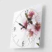 Amandelboombloemen met sneeuw vierkante klok (Hoek)