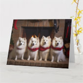 Amerikaanse Eskimo bij de open haard Kerstmis Kaart (Gele Bloem)