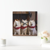 Amerikaanse Eskimo bij de open haard Kerstmis Vierkante Klok (Huis)