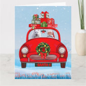 Amerikaanse eskimo-hond in auto's met kerstbedekki kaart (Voorkant)