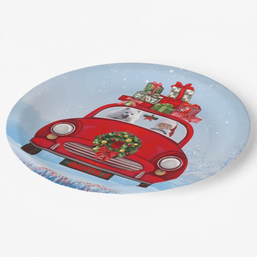 Amerikaanse eskimo-hond in auto's met kerstbedekki papieren bordje (Gekanteld)