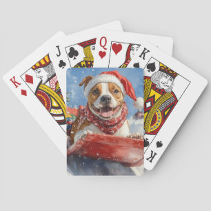 Amerikaanse Staffordshire in Kerst op een slee Pokerkaarten
