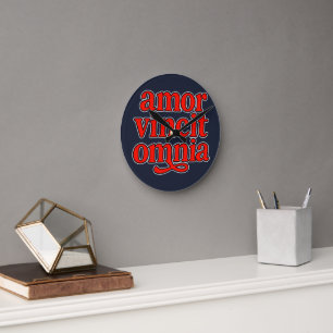Amor vincit omnia ronde klok