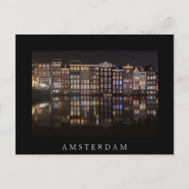 Amsterdam huizen met kleurrijke lichten in de nach briefkaart