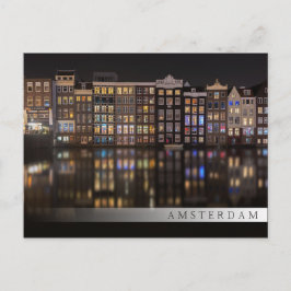 Amsterdam huizen met kleurrijke lichten in de nach briefkaart