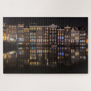 Amsterdam huizen met kleurrijke lichten in de nach legpuzzel