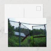 An abandoned house beyond the broken fence. briefkaart (Voorkant / Achterkant)