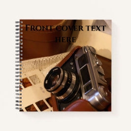 analoge camera in leder bruin hoesje notitieboek