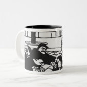 Anarchist, 1892 tweekleurige koffiemok (Voorkant links)