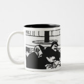 Anarchist, 1892 tweekleurige koffiemok (Links)