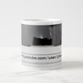 Andy de Perzische kat slaapt graag in de droger. Grote Koffiekop (Voorkant)