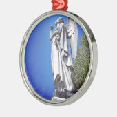 Angel en een heldere blauwe hemel metalen ornament (Links)