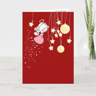 Angel spelen met kerstversieringen feestdagen kaart