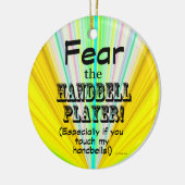 Angst voor de zakbelspeler keramisch ornament (Links)