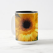 Anjers en geelgerbera tweekleurige koffiemok (Voorkant links)