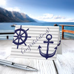 Anker Boot Roer Wiel Scheepvaart Felicitatie Kaart<br><div class="desc">Dit decoratieve ontwerp bevat zowel een donker marineblauw anker als een scheepswiel met grijze en witte strepen. De scheepvaartillustratie maakt van deze kaart een moderne en unieke wenskaart met gepersonaliseerde tekst en achtergrondkleur - Gefeliciteerd!</div>