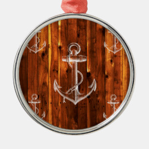 anker op donkere houten planken metalen ornament