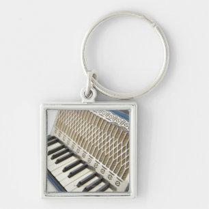 Antiek cordion-toetsenbord sleutelhanger