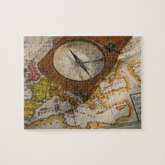 Antiek kompas op kaart legpuzzel (Horizontaal)