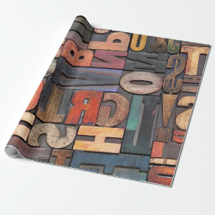 antiek letterdruk en blokken met kleurinktpatroon cadeaupapier
