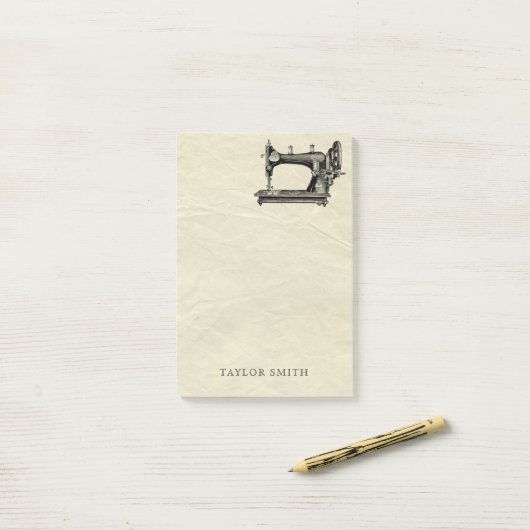 Antiek naaimachine met naam post-it® notes (Op bureau)