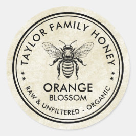 Antiek oranje Blossom honing etiket met honingbij
