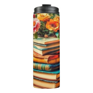 Antiek stapel  boeken en bloemen thermosbeker