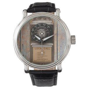 Antiek telefoontoestel met mobiele telefoon robuus horloge