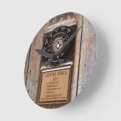 Antiek telefoontoestel met mobiele telefoon robuus ronde klok (Hoek)