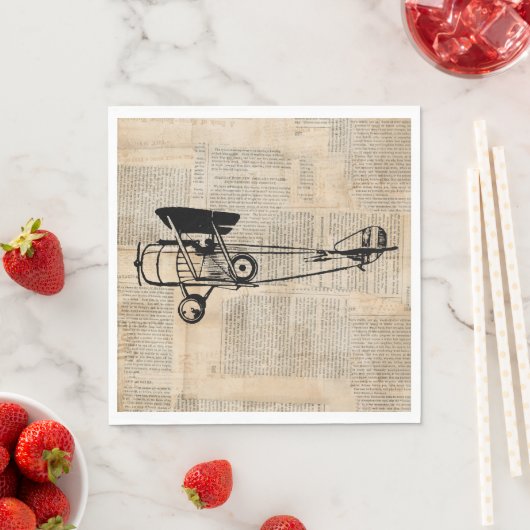  Antiek vliegtuig op krantentekst Servet (Insitu)