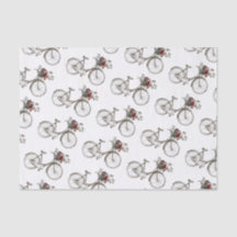 Antieke fiets met mandje bloemen