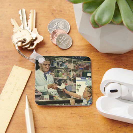 Antieke geneeskunde, apotheker en meisje bij de ap sleutelhanger (Bureau)