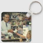 Antieke geneeskunde, apotheker en meisje bij de ap sleutelhanger (Achterkant)