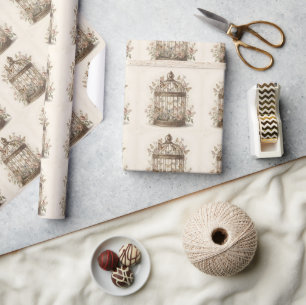 Antieke kooi met bloemen en vlinders cadeaupapier