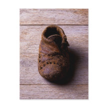 Antieke leren babyschoen, met de hand gemaakte ges