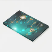 Antieke skelet sleutels op groene achtergrond post-it® notes (Schuin)