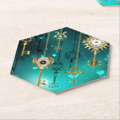 Antieke skeletsleutels op een groene achtergrond kartonnen onderzetters (Schuin)