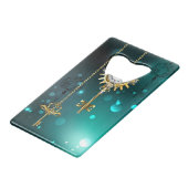 Antieke skelettoetsen op groene achtergrond creditkaart flessenopener (Achterkant Gekanteld)