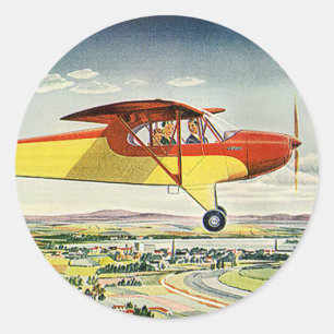 Antieke vliegtuigen boven landbouwvelden ronde sticker