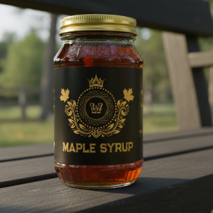 Antieke zwarte en gouden monogram esdoornsiroop la etiket