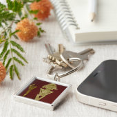 Antropomorfe figuur van een krijger sleutelhanger (Zijkant)