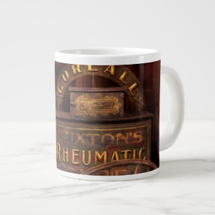Apotheek - De Rheumatische Kuurwagen Grote Koffiekop