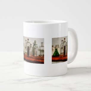 Apothekersflessen hoog en laag grote koffiekop
