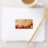 Appels op houten achtergrond etiket (Insitu)