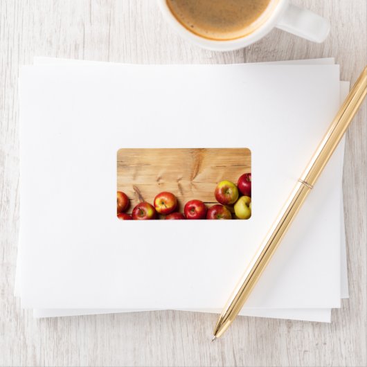 Appels op houten achtergrond etiket (Insitu)