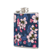 Apple bloesem op een donkerblauw heupfles (Links)