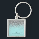 Aqua Blue Blauwgroen Silver Glitter Monogram Sleutelhanger<br><div class="desc">Aqua Blue - Blauwgroen en Zilver Sparkle Glitter Script Monogram Name Keychains (Sleutelhanger). Dit maakt de perfecte liefhebbende 16 verjaardag,  bruiloft,  vrijgezellenfeest,  verjaardagsdag,  baby shower of vrijgezellenfeest voor iemand die van luxe glam en stijl houdt.</div>